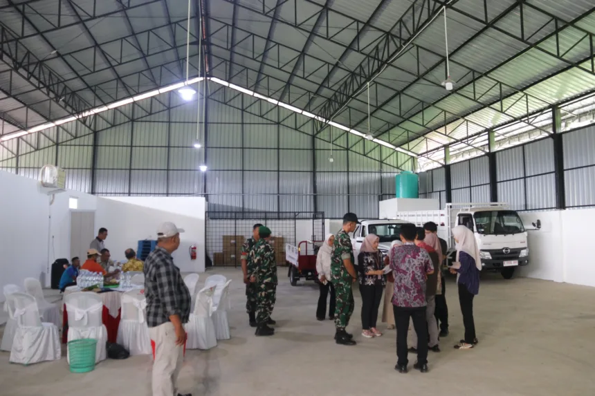 Tim saat melakukan verifikasi gedung KDKMP